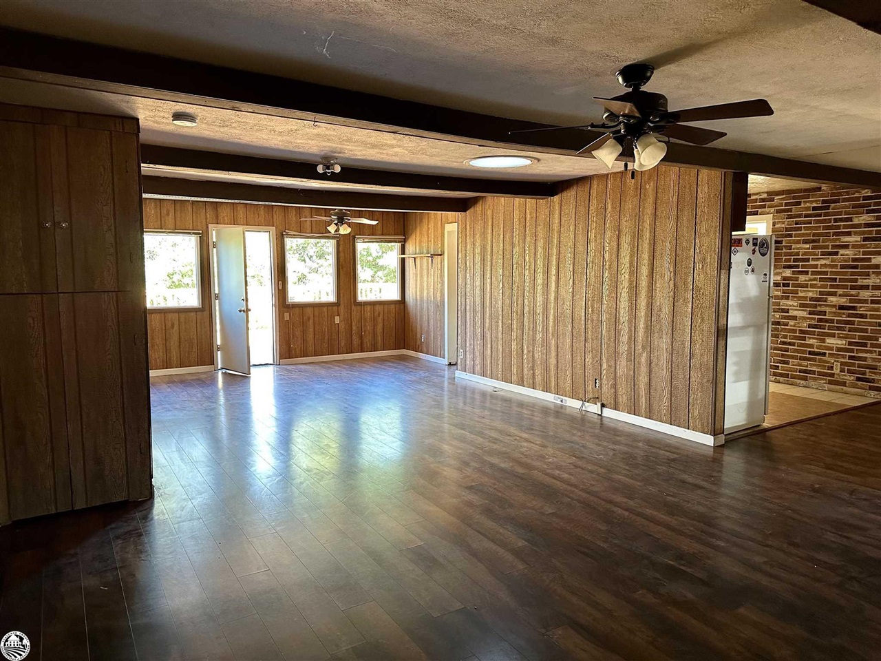 330 Higdon Road West Point, CA 95255 - Photo 7 of 31 a view of an empty room with wooden floor and a window