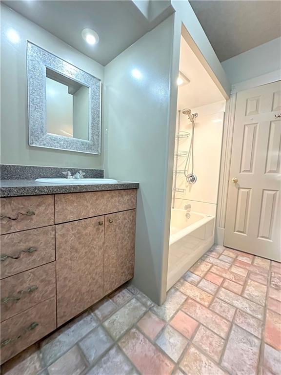 341 Kramer Way Pittsburgh, PA 15211 - Photo 29 of 37 The sun-filled Master Bath, measuring 9'x5', is a beautifully designed space where practicality meets style. The floor features a unique ceramic tile pattern, combining 6"x6" and 6"x12" tiles, providing durability and a visually interesting design. The layout is comfortable and efficient, with custom-designed cabinetry that includes designer pulls and handles, adding a touch of elegance to the room. This Master Bath is a perfect blend of functionality and refined design.