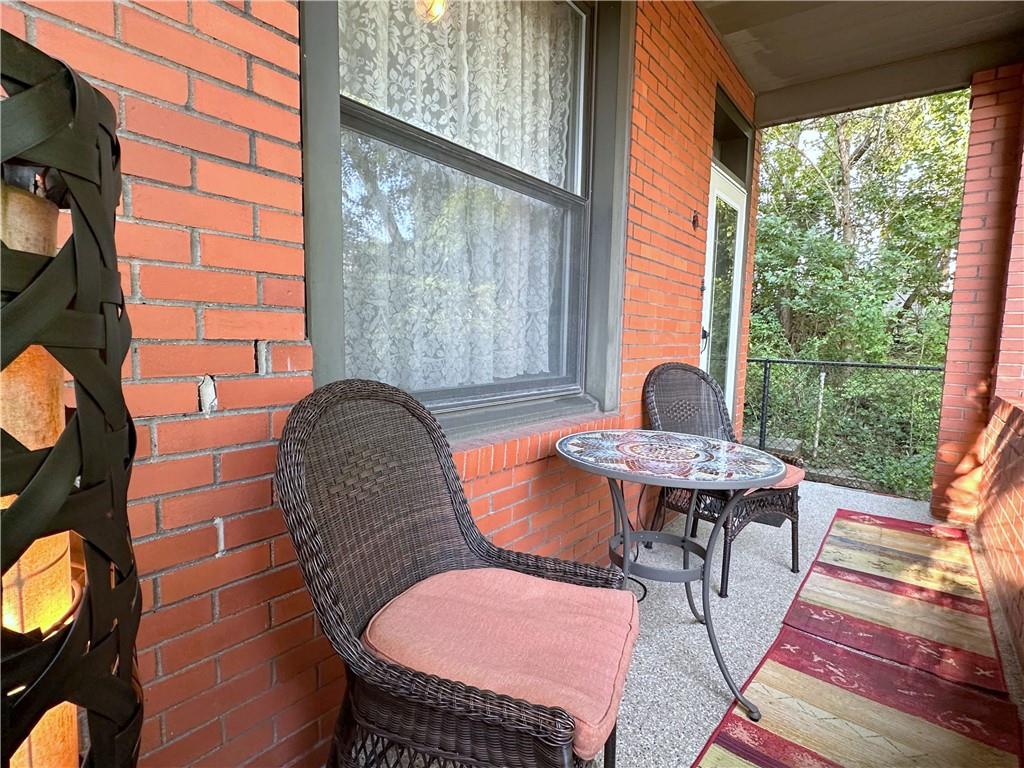 341 Kramer Way Pittsburgh, PA 15211 - Photo 4 of 37 The covered porch itself is a simple yet inviting design, with sturdy brick columns and the rich epoxy coating of the floor, offering privacy and a sense of being away from the hustle and bustle, even though downtown Pittsburgh is a short 7-minute drive away, and it is just 4 minutes to Grandview Avenue and its spectacular, panoramic views, and Grandview’s restaurants and shops; so very Pgh “Soho”!