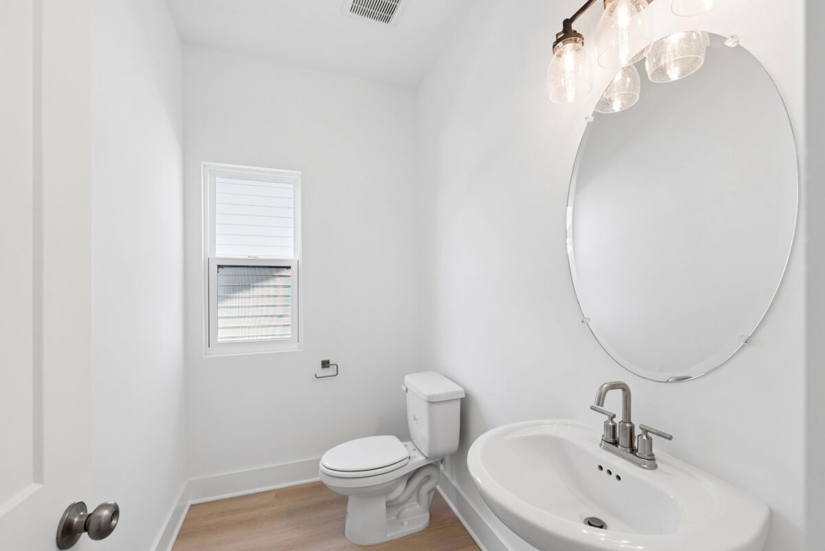 108 Hamilton Lane Lebanon, TN 37087 - Photo 33 of 40 a bathroom with a sink a toilet and a mirror