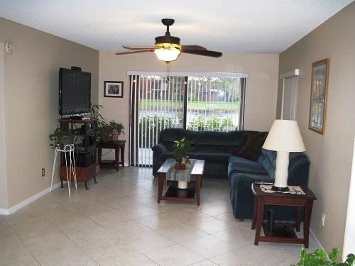 8127 Boca Rio Drive Boca Raton, FL 33433 - Photo 5 of 35 Living room to lake