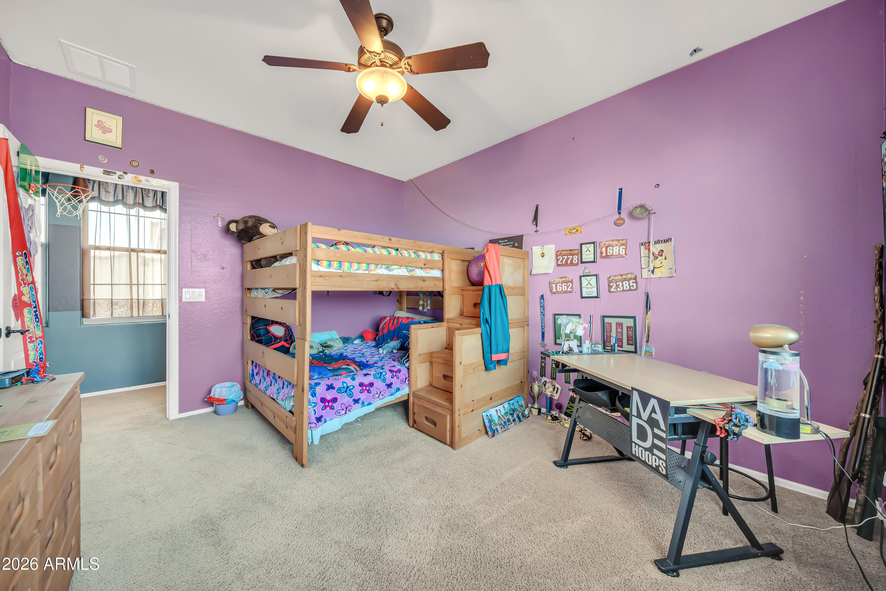 15327 West Roma Avenue Goodyear, AZ 85395 - Photo 36 of 65 a bedroom with furniture and a bed