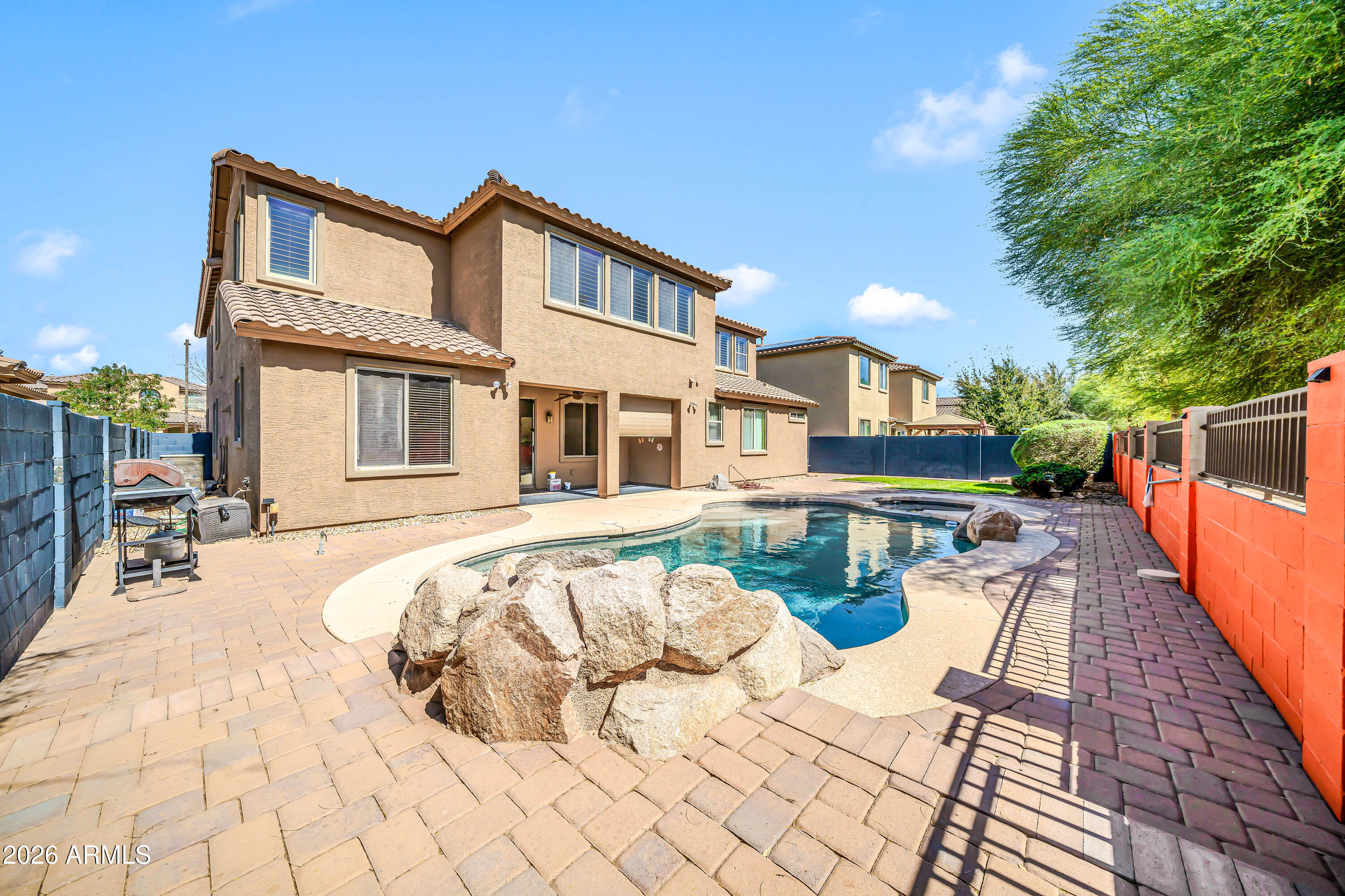 15327 West Roma Avenue Goodyear, AZ 85395 - Photo 55 of 65 a view of a house with swimming pool