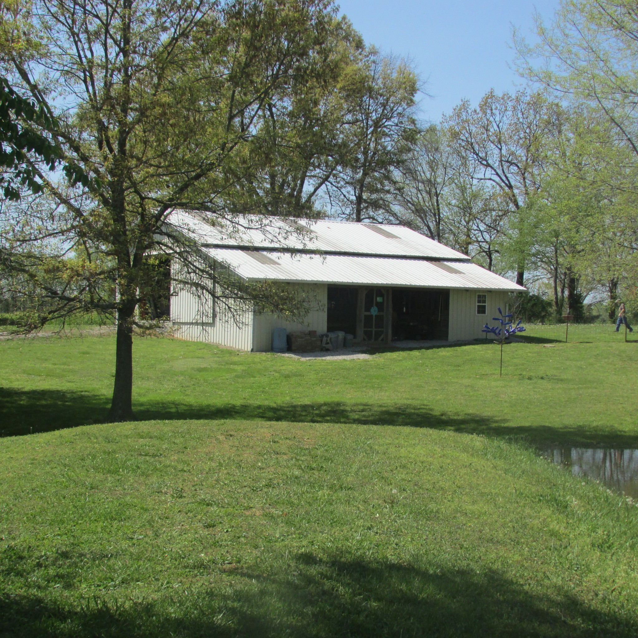 75 Snell Road Ethridge, TN 38456 - Photo 34 of 51 a front view of a house with a yard