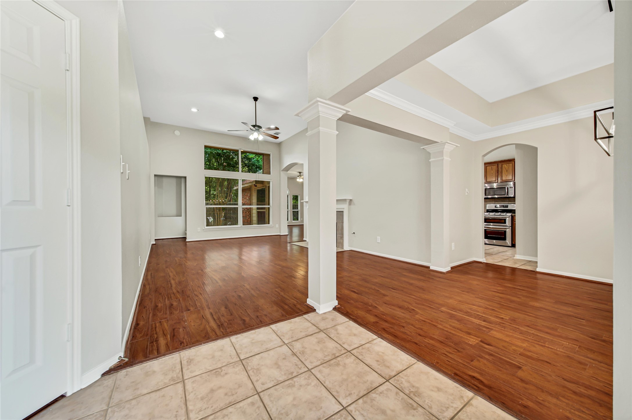 14526 Red Tailed Hawk Lane Houston, TX 77044 - Photo 37 of 40 wooden floor in an empty room with a window
