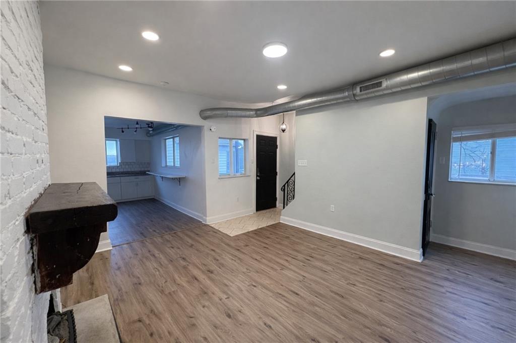 1921 Shamokin Street Pittsburgh, PA 15203 - Photo 3 of 10 a view of empty room with wooden floor