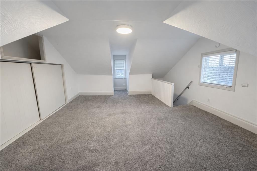 1921 Shamokin Street Pittsburgh, PA 15203 - Photo 10 of 10 an empty room with windows and entrance