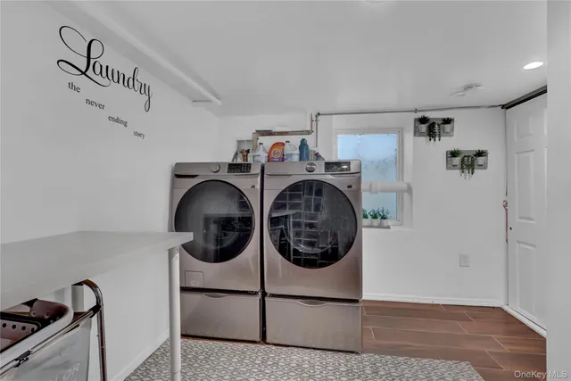 a utility room with dryer and washer