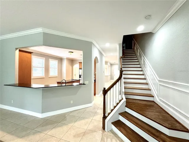 a view of a living room with a large window