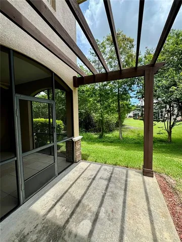 a view of porch with a garden