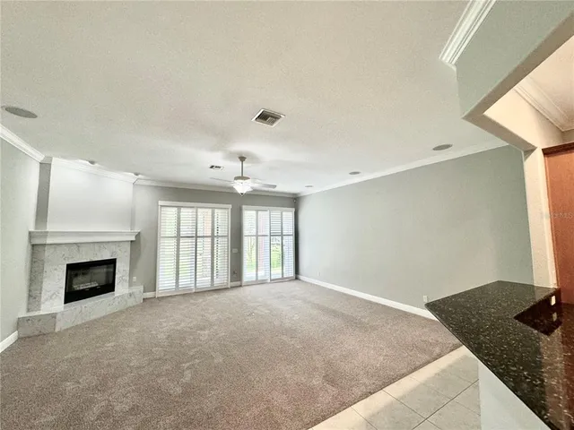 a spacious bathroom with a sink mirror and a bathtub