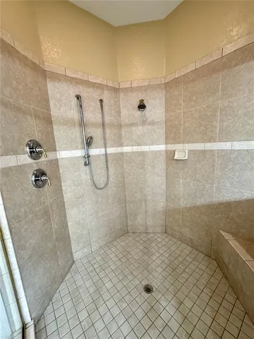 a view of empty room with windows