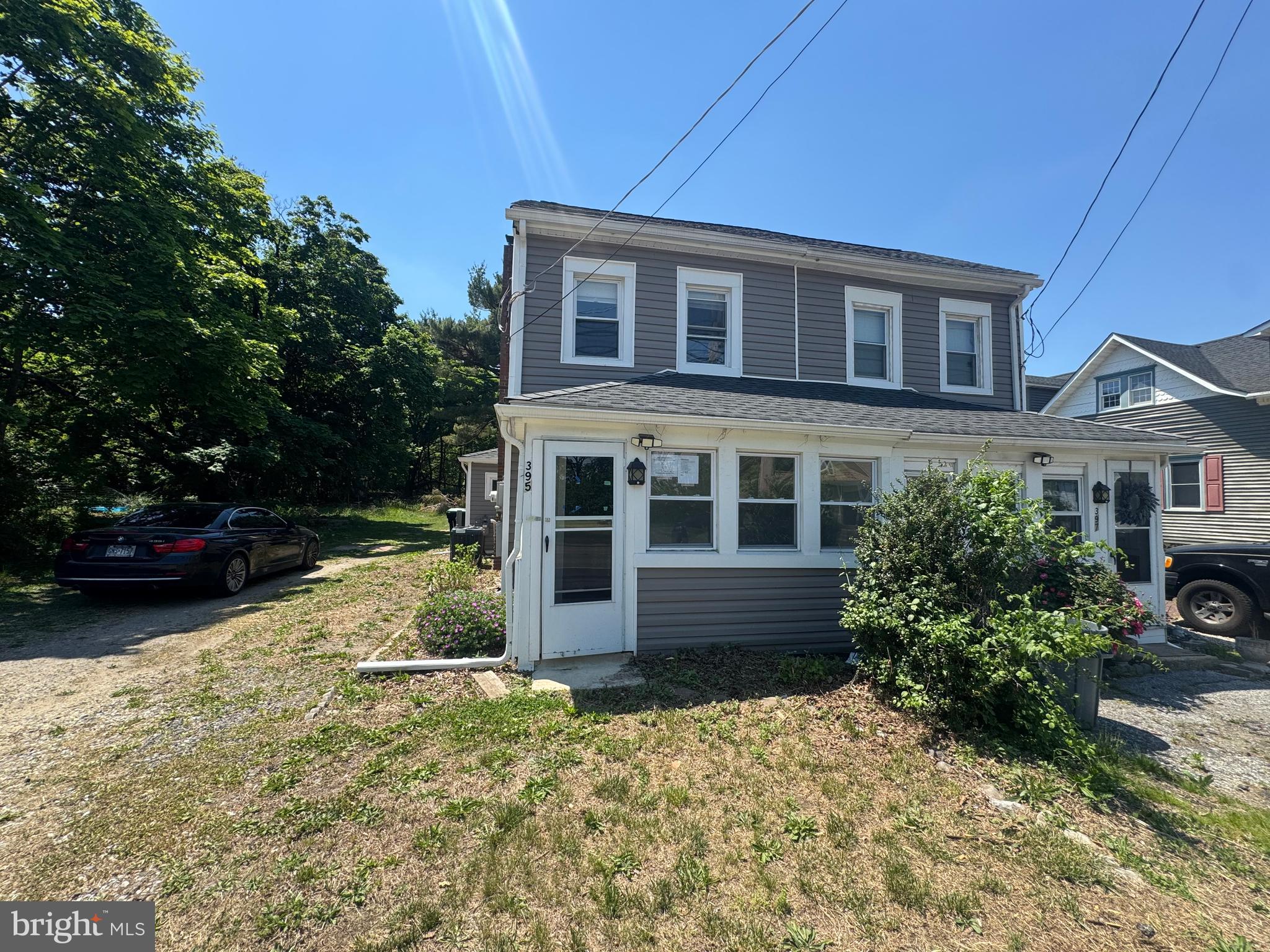 395 Tansboro Road Berlin, NJ 08009 - Photo 2 of 47 front view of a house with a yard