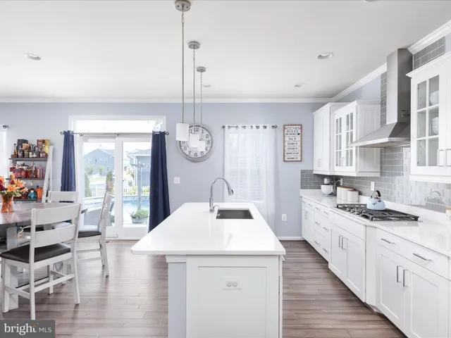 a bathroom with a sink toilet and tub