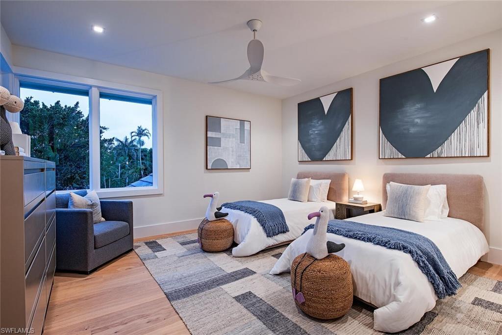 2999 Rum Row Naples, FL 34102 - Photo 28 of 33 Bedroom with baseboards, a ceiling fan, wood finished floors, and recessed lighting