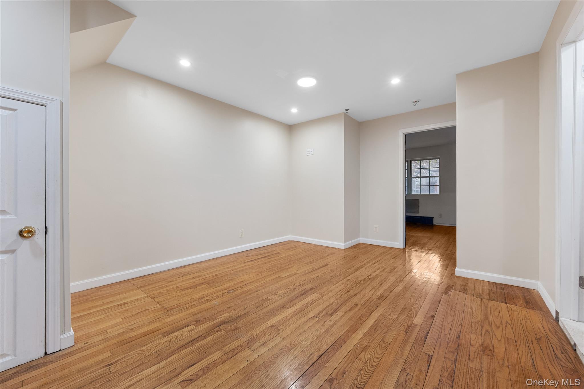 108-10 35th Avenue Queens, NY 11368 - Photo 11 of 29 Empty room with light wood-type flooring and recessed lighting