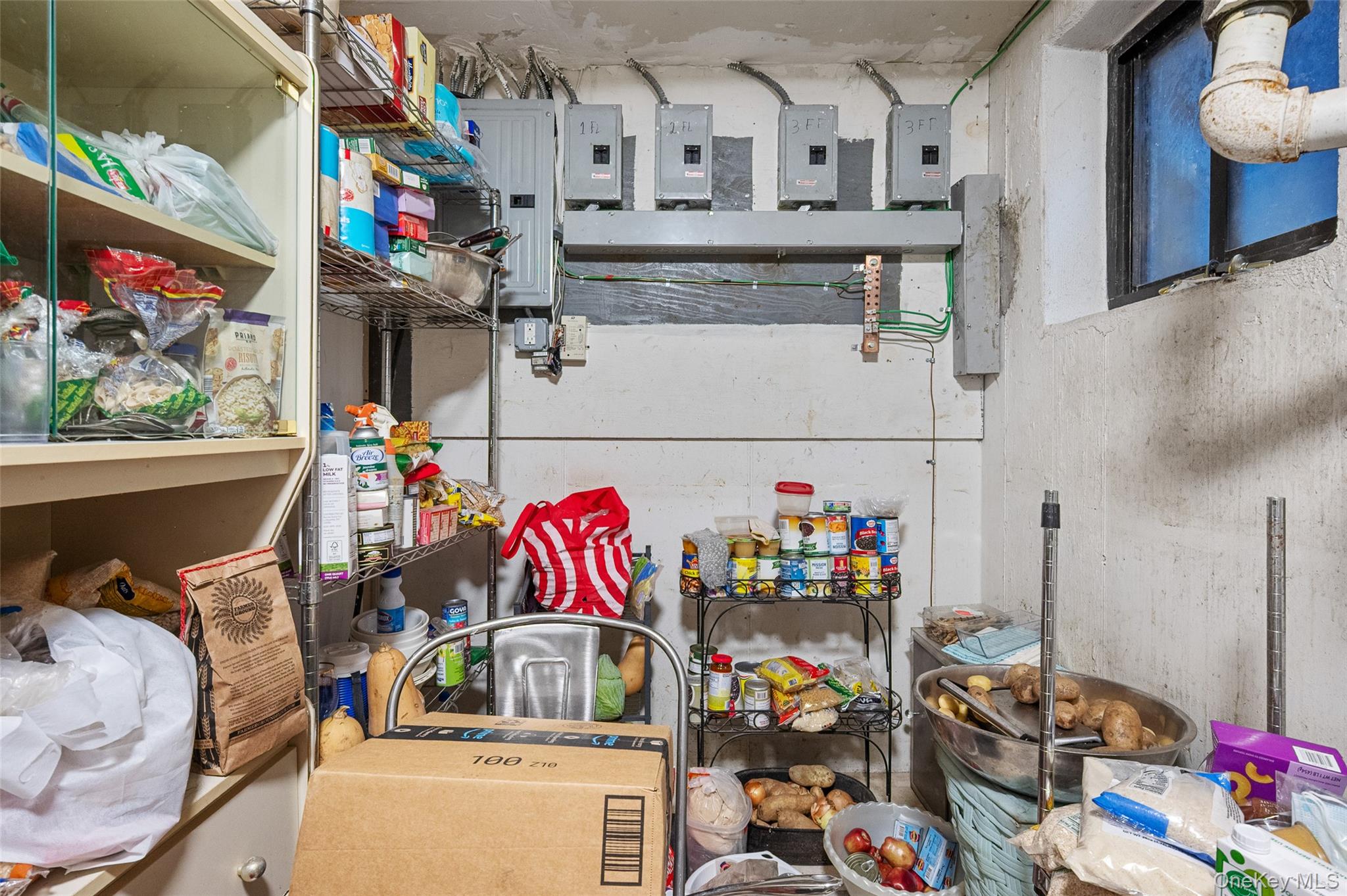 108-10 35th Avenue Queens, NY 11368 - Photo 21 of 29 Storage area featuring electric panel