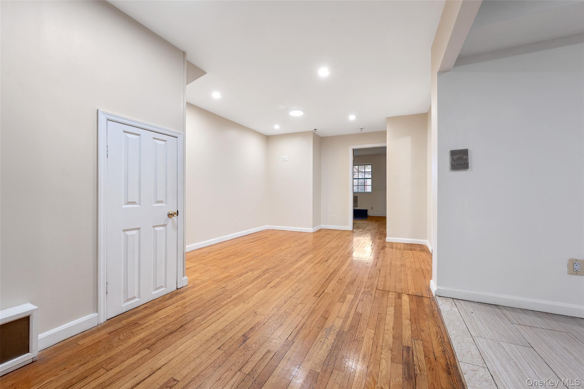 108-10 35th Avenue Queens, NY 11368 - Photo 3 of 29 Empty room featuring recessed lighting and light wood-style flooring