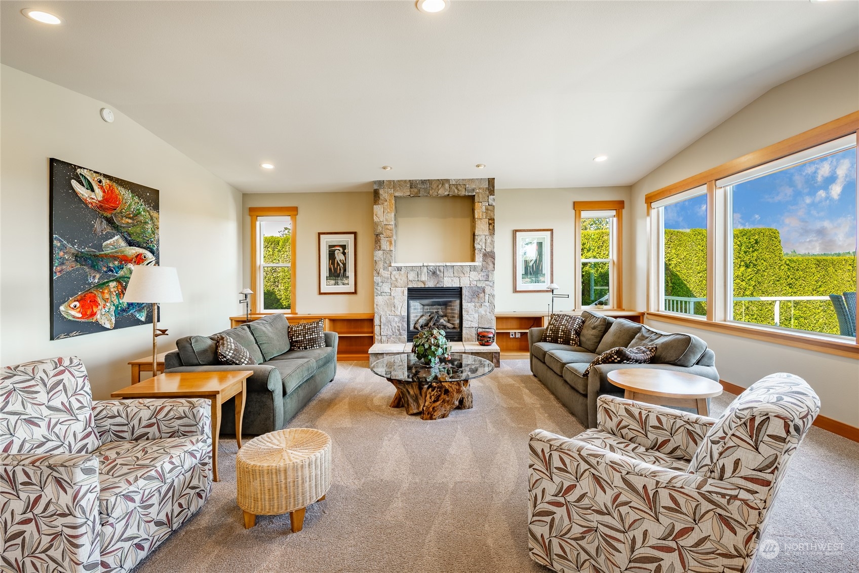 8148 Comox Road Blaine, WA 98230 - Photo 14 of 40 a living room with furniture fireplace and a large window