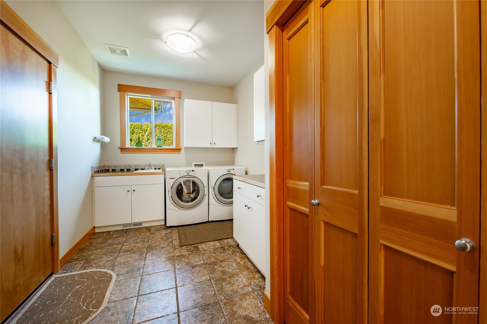 8148 Comox Road Blaine, WA 98230 - Photo 16 of 40 a utility room with dryer and washer