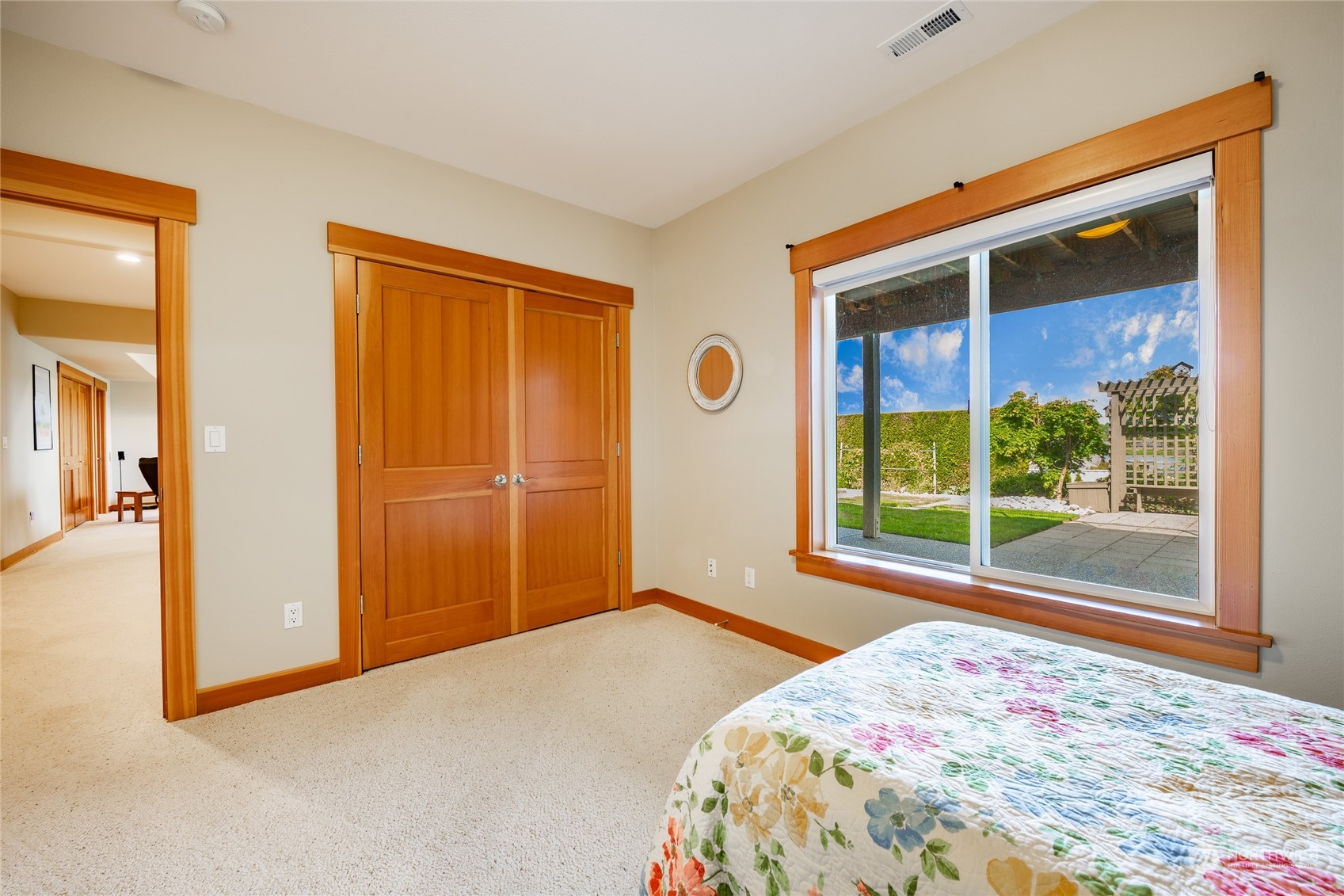 8148 Comox Road Blaine, WA 98230 - Photo 24 of 40 a bedroom with a bed and a window