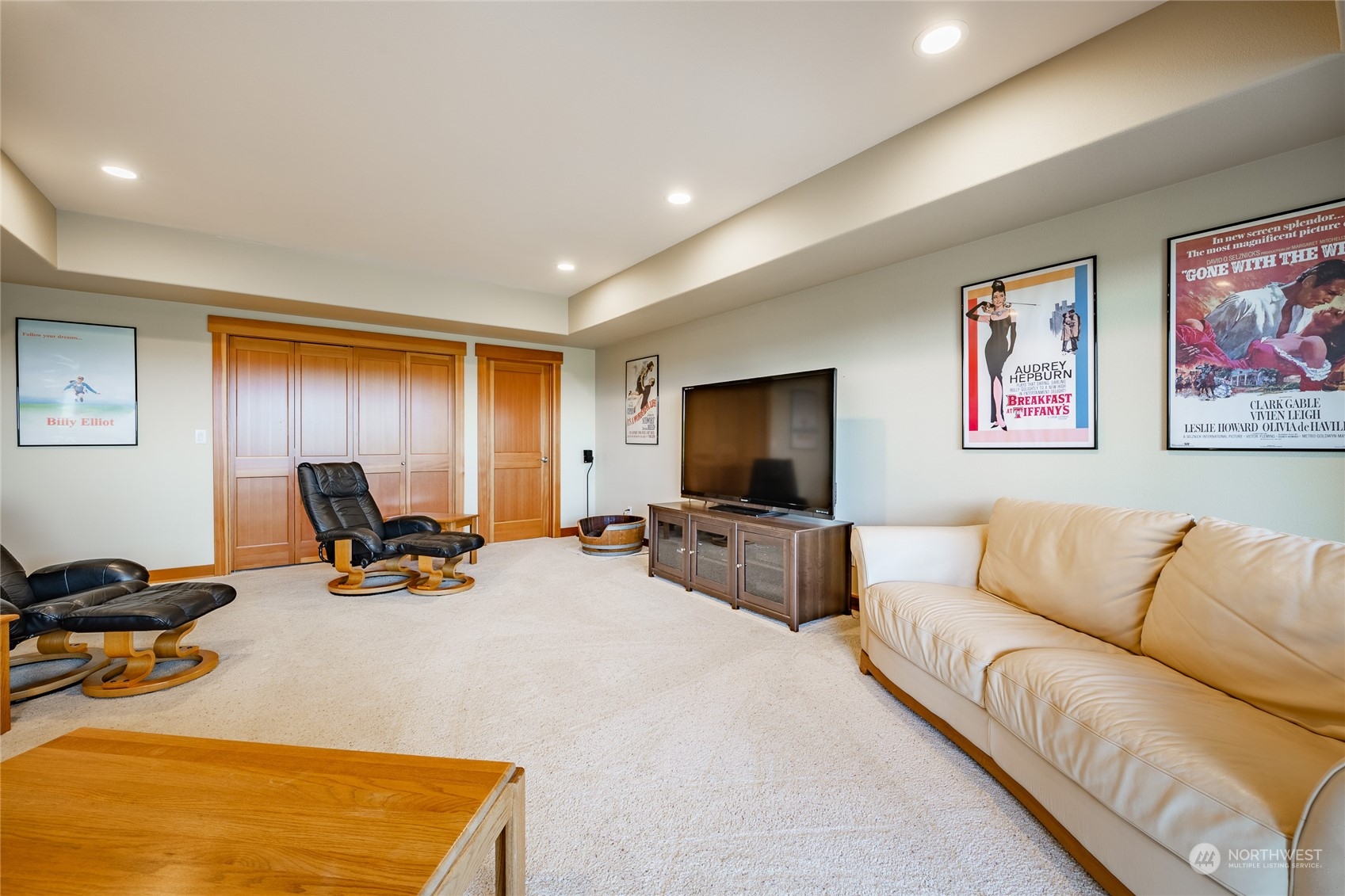 8148 Comox Road Blaine, WA 98230 - Photo 30 of 40 a living room with furniture a flat screen tv and a couch