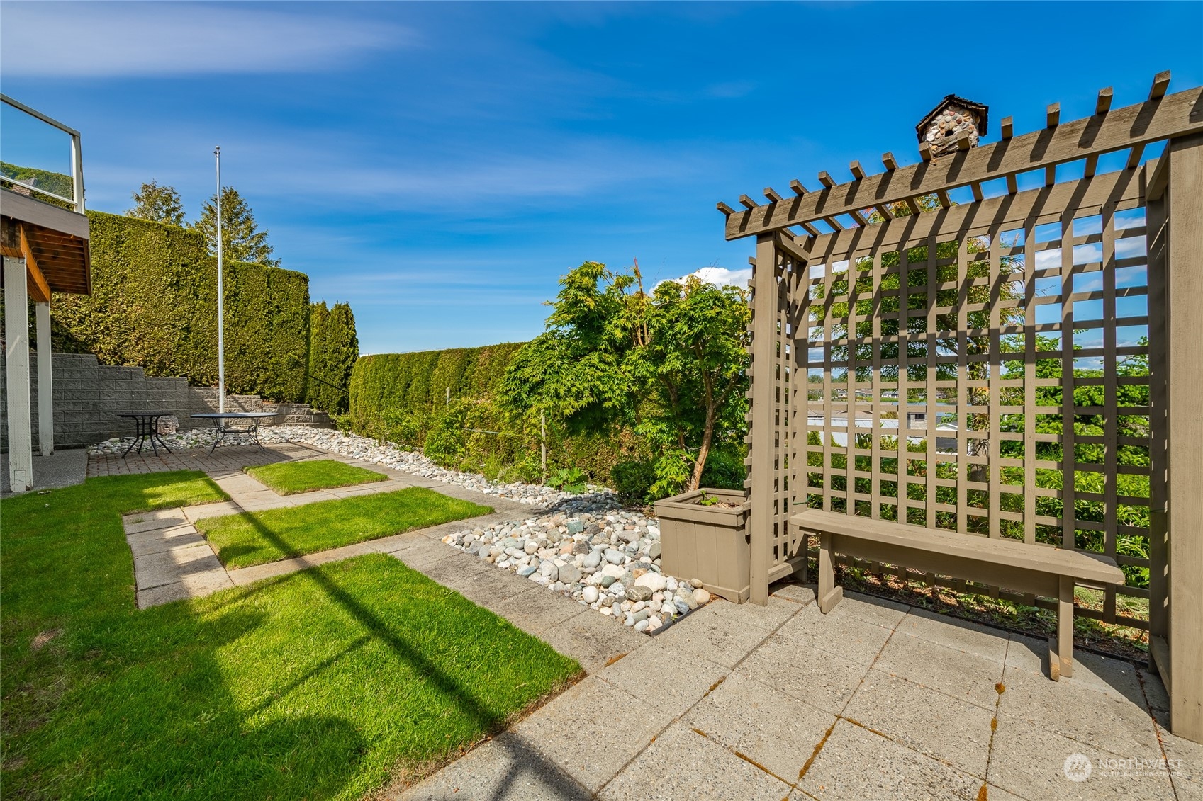 8148 Comox Road Blaine, WA 98230 - Photo 33 of 40 a view of a backyard with plants
