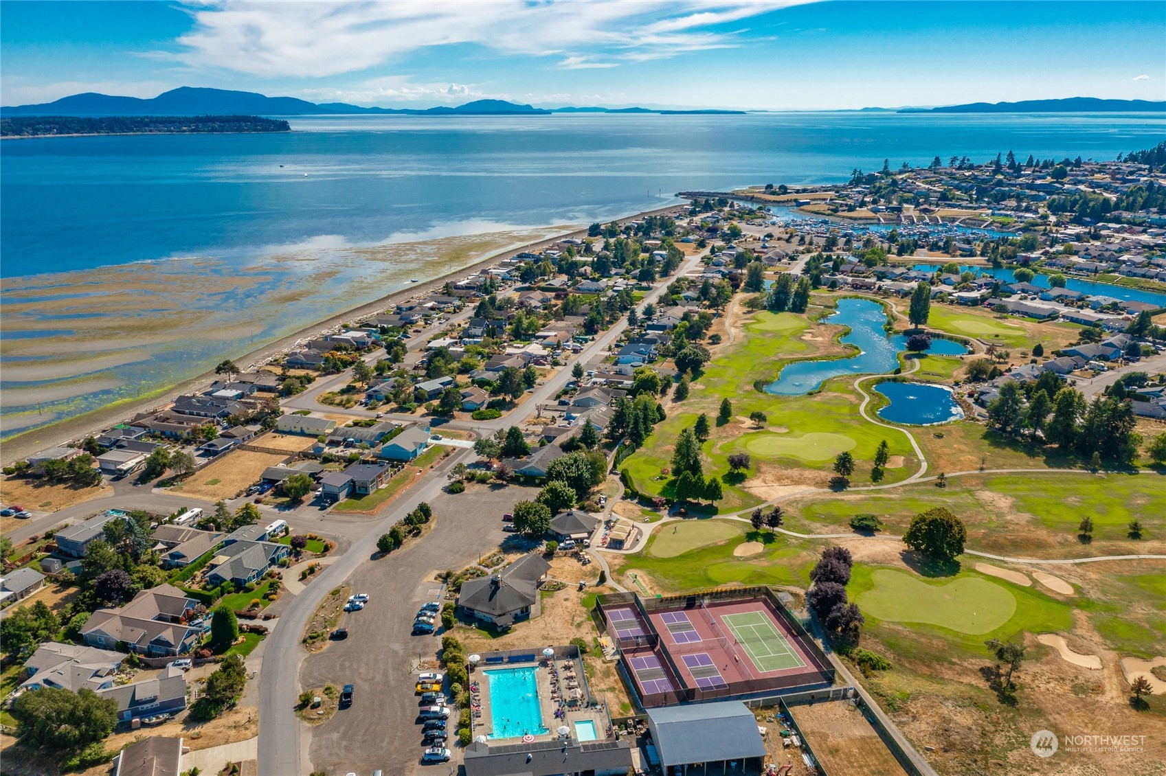 8148 Comox Road Blaine, WA 98230 - Photo 39 of 40 an aerial view of residential houses with outdoor space
