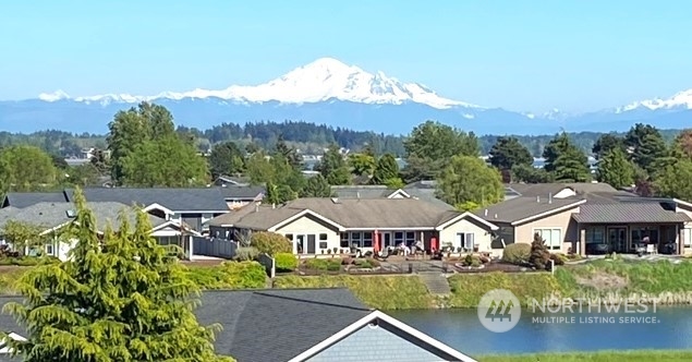 8148 Comox Road Blaine, WA 98230 - Photo 40 of 40 an aerial view of a house with swimming pool and a yard