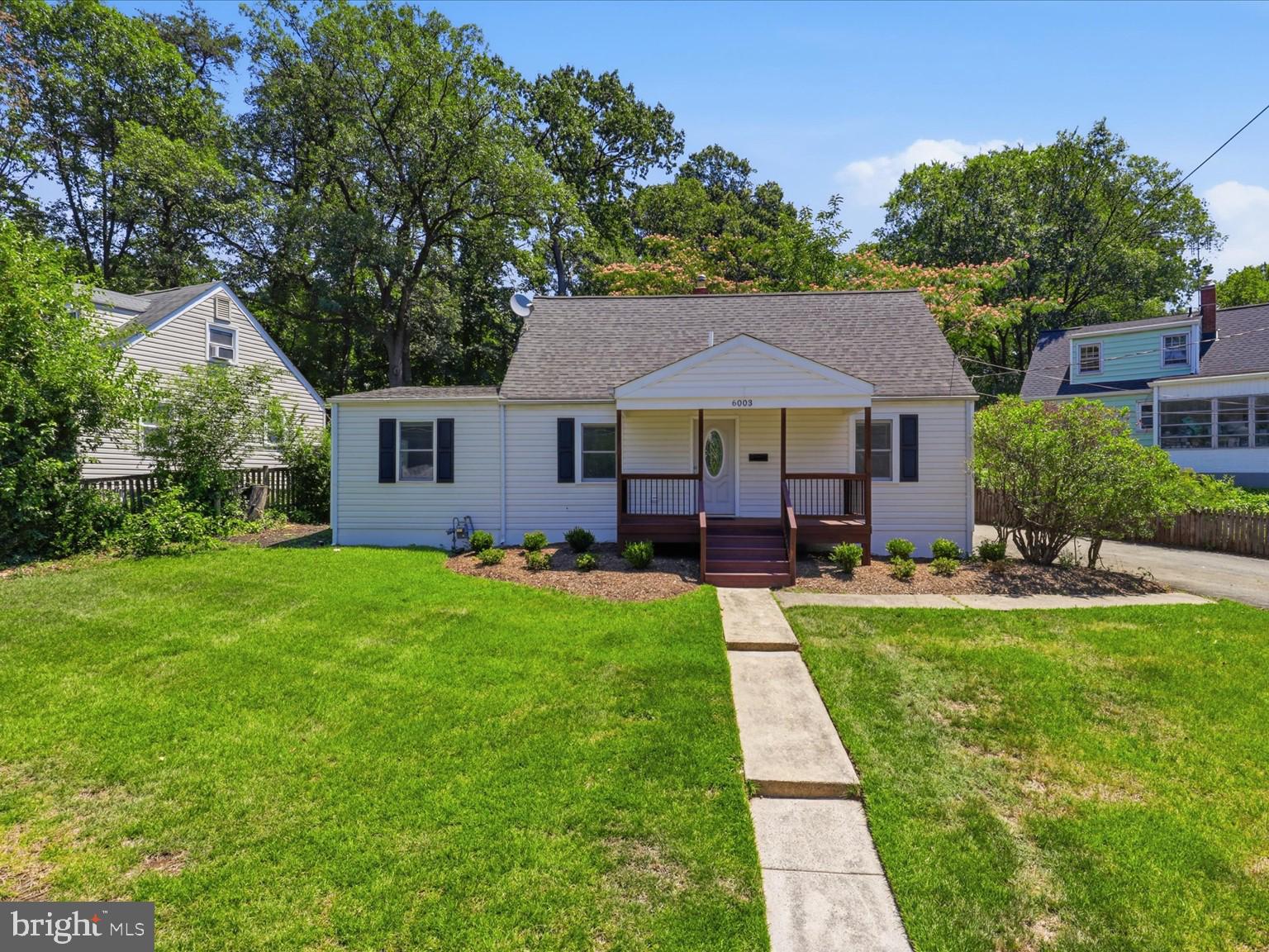 6003 Rixey Drive Alexandria, VA 22303 - Photo 1 of 37 Charming home with lush green lawn.