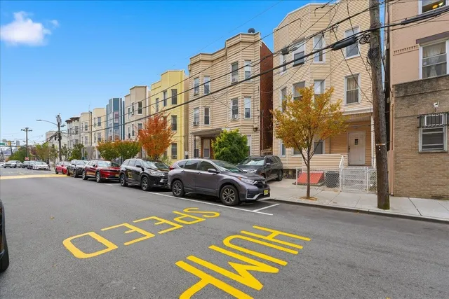 a view of a street with cars