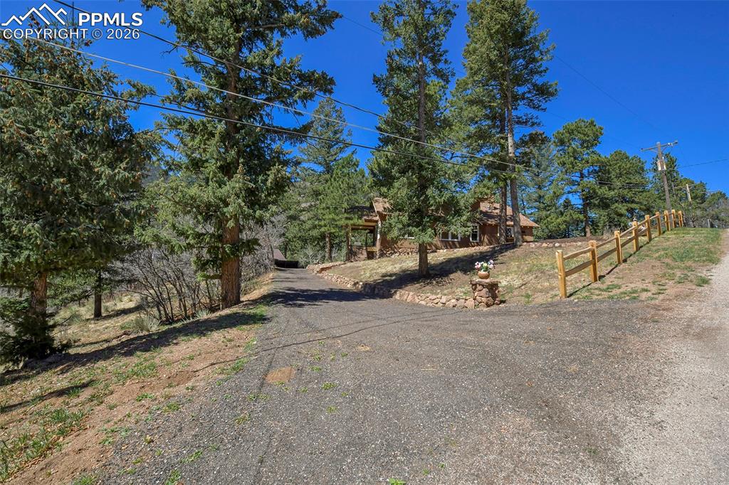 4530 Hagerman Road Cascade, CO 80809 - Photo 45 of 47 View Of Home, Large Lot, And Driveway, From The Street