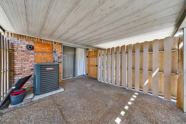 a view of an empty room with stairs