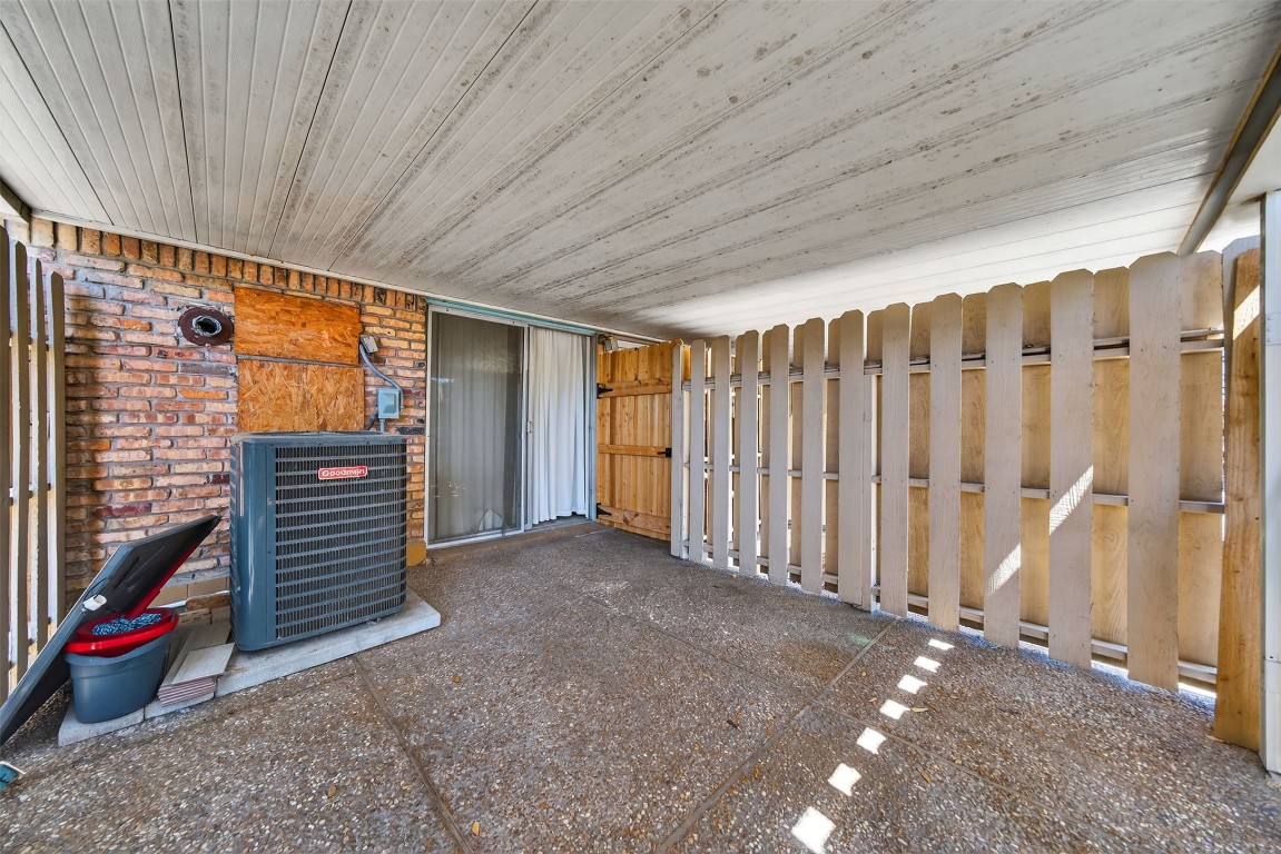 7205 Beechnut Street, Unit D Houston, TX 77074 - Photo 15 of 20 a view of an empty room with stairs