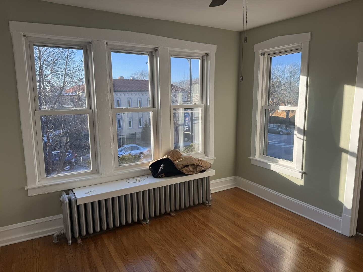 4253 North Austin Avenue, Unit 2 Chicago, IL 60634 - Photo 4 of 9 a living room with furniture and a window
