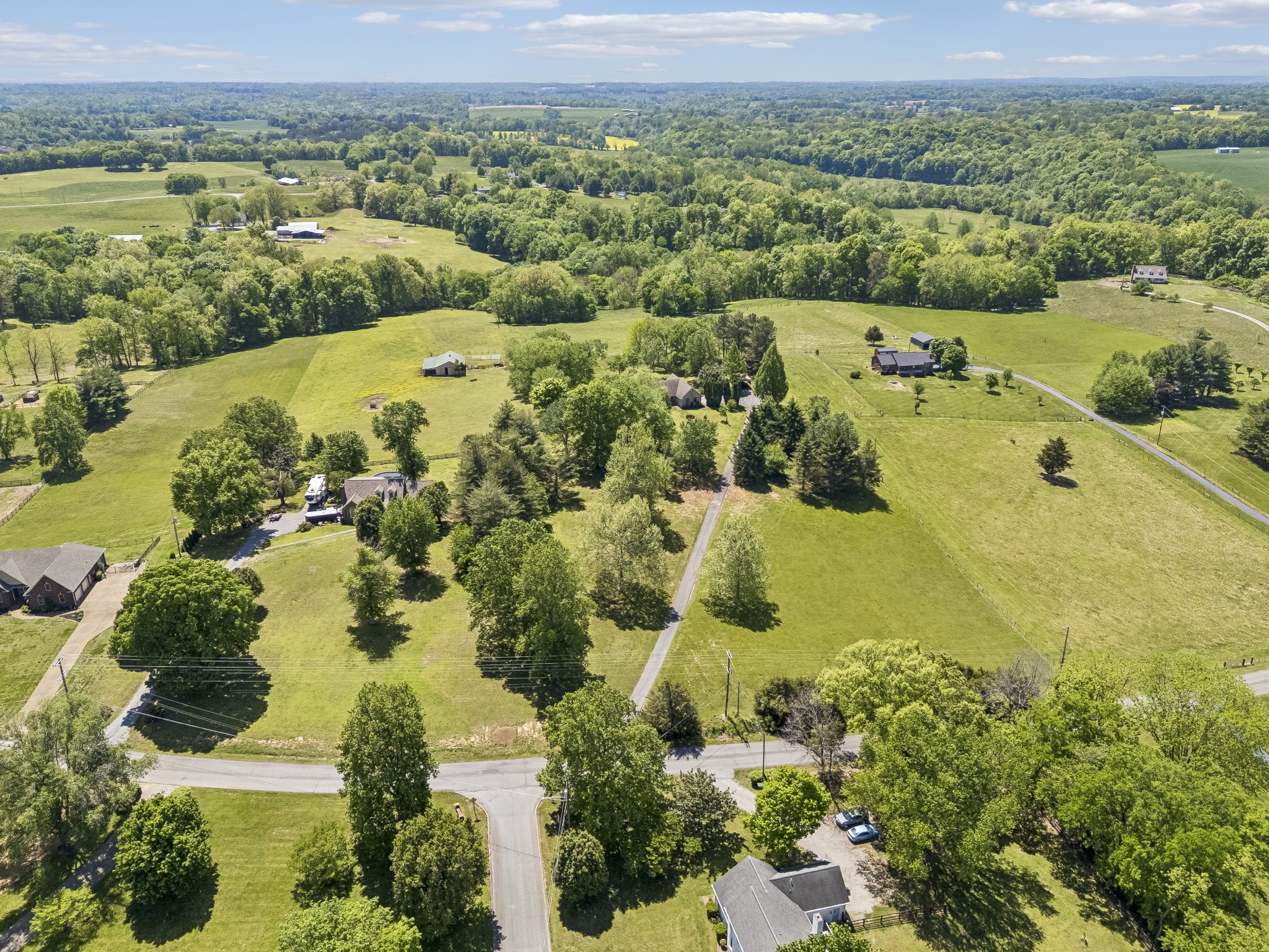 1690 Lawrence Lane Springfield, TN 37172 - Photo 36 of 64 an aerial view of ocean with residential house and lake view