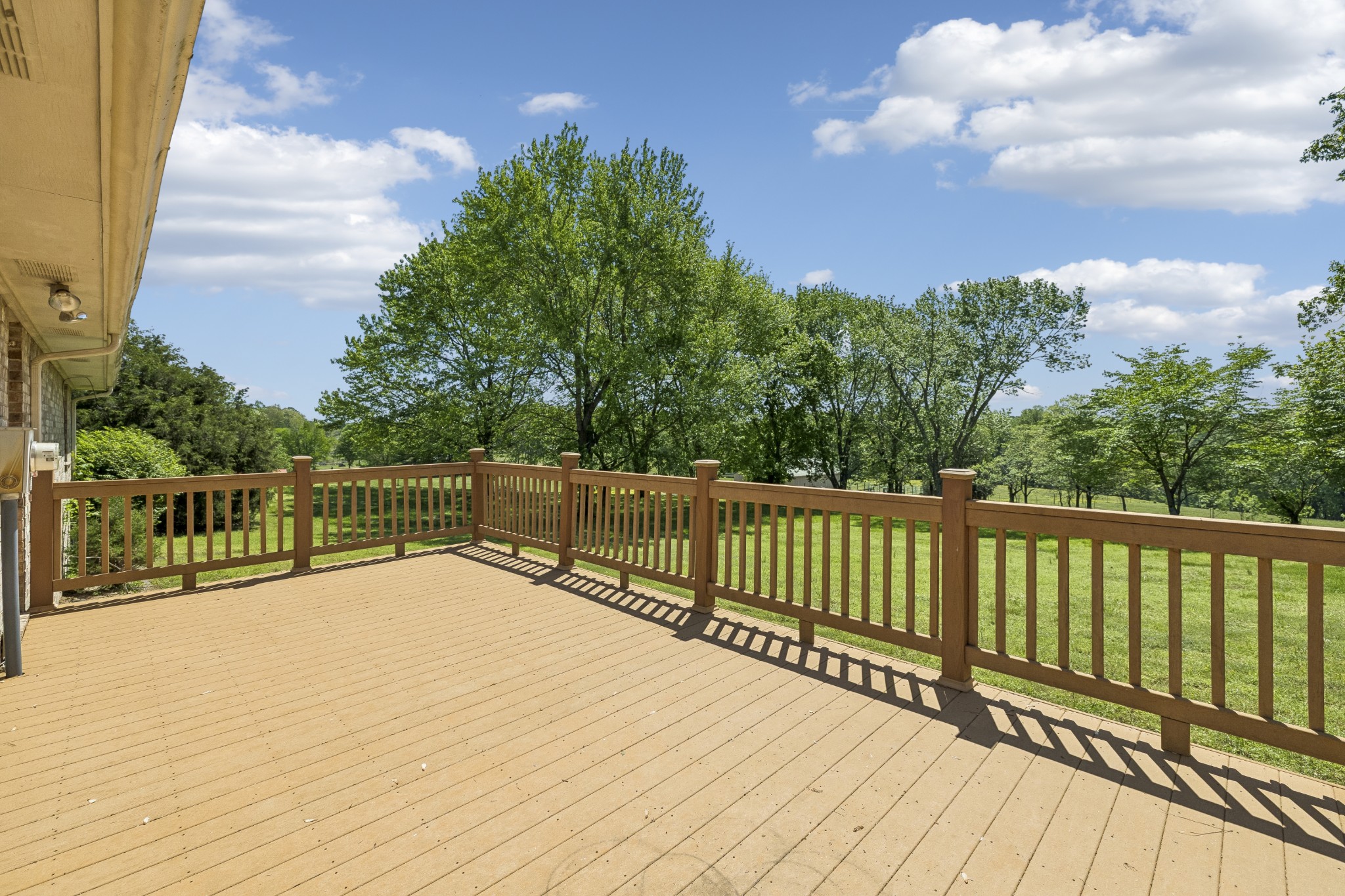 1690 Lawrence Lane Springfield, TN 37172 - Photo 47 of 64 a view of balcony with wooden floor and fence