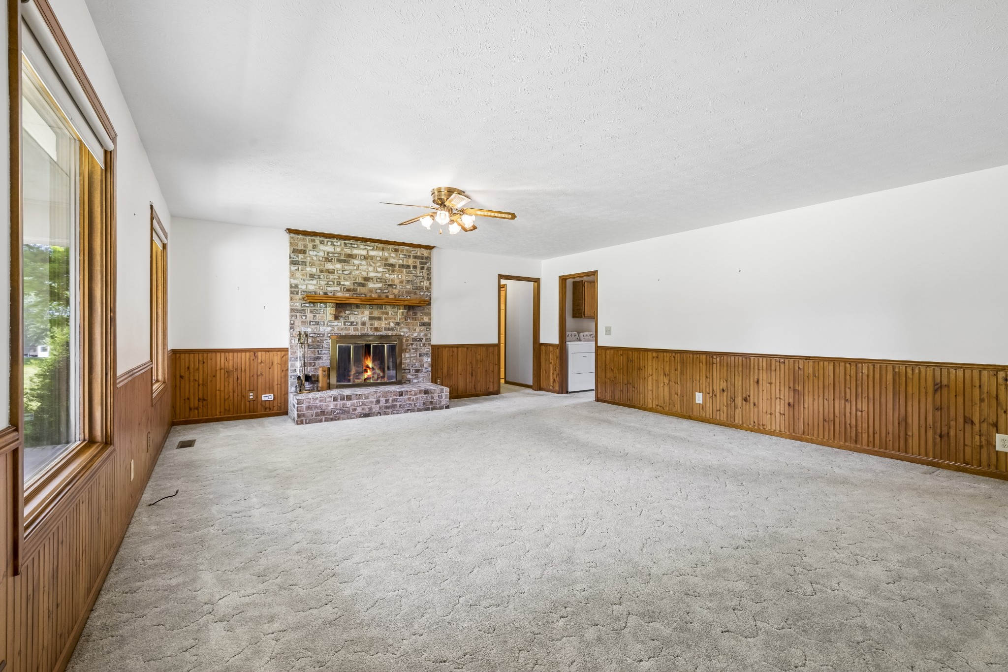 1690 Lawrence Lane Springfield, TN 37172 - Photo 7 of 64 a view of a livingroom with furniture and a flat screen tv