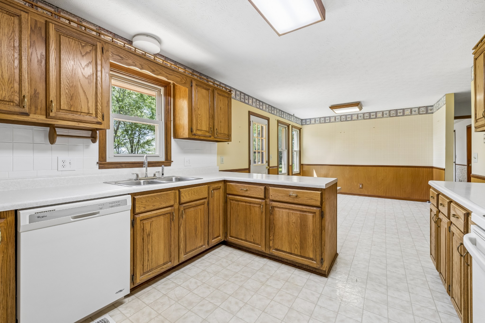 1690 Lawrence Lane Springfield, TN 37172 - Photo 10 of 64 a kitchen with stainless steel appliances granite countertop a sink and cabinets