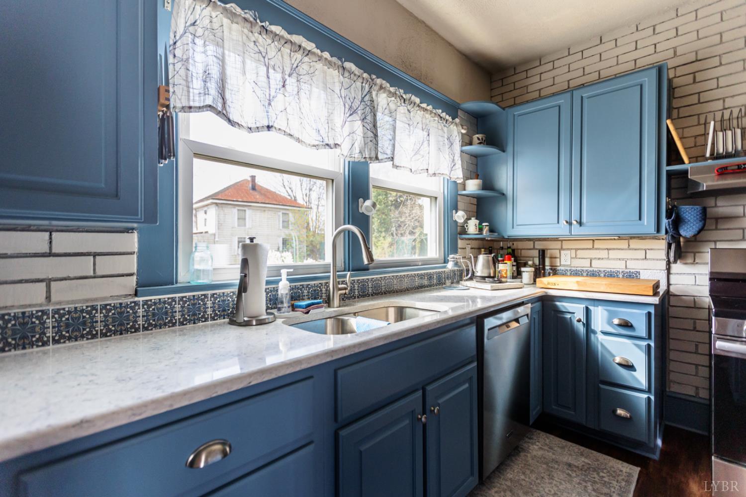 172 Pecan Street Pamplin, VA 23958 - Photo 15 of 40 a kitchen with a sink and cabinets
