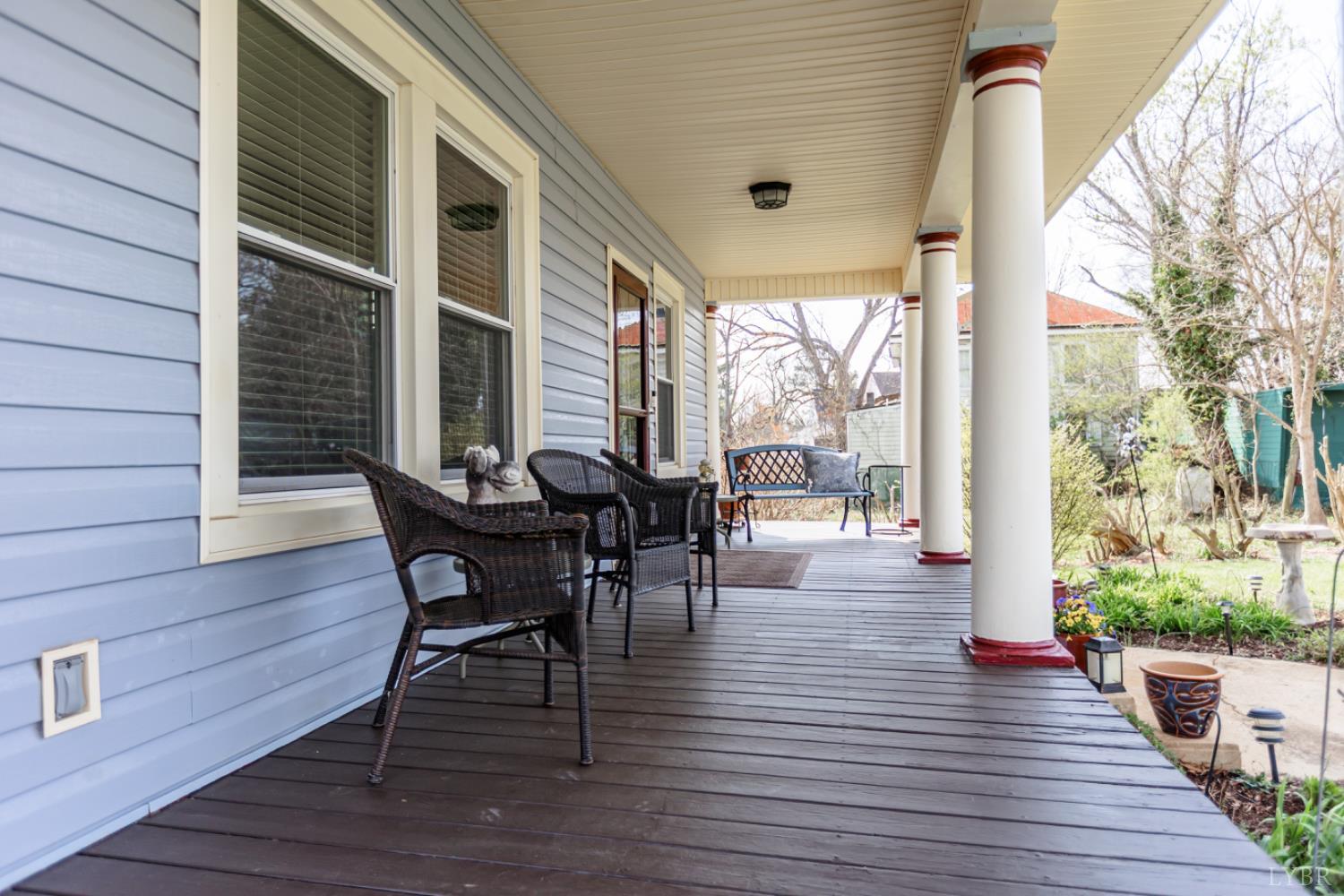 172 Pecan Street Pamplin, VA 23958 - Photo 32 of 40 a view of a patio with table and chairs and wooden floor