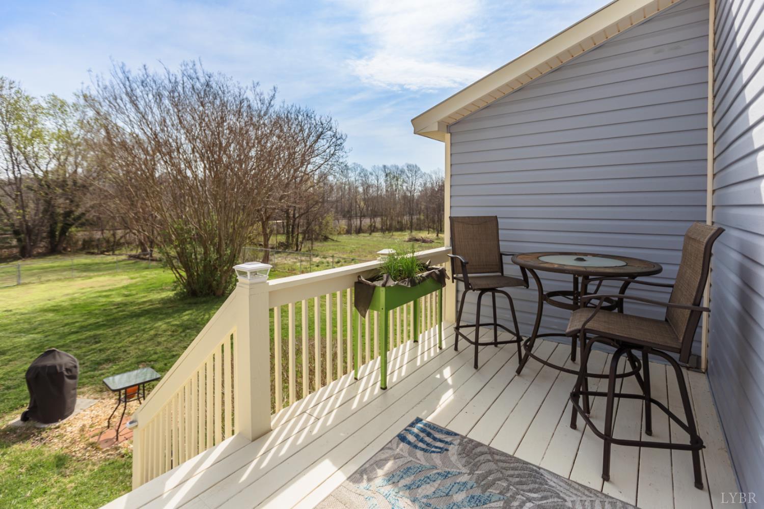 172 Pecan Street Pamplin, VA 23958 - Photo 37 of 40 a view of a deck with chairs and wooden fence