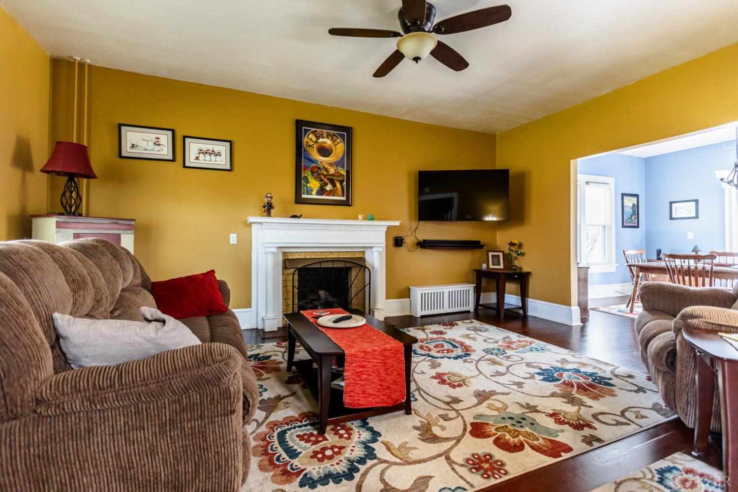172 Pecan Street Pamplin, VA 23958 - Photo 7 of 40 a living room with furniture and a flat screen tv