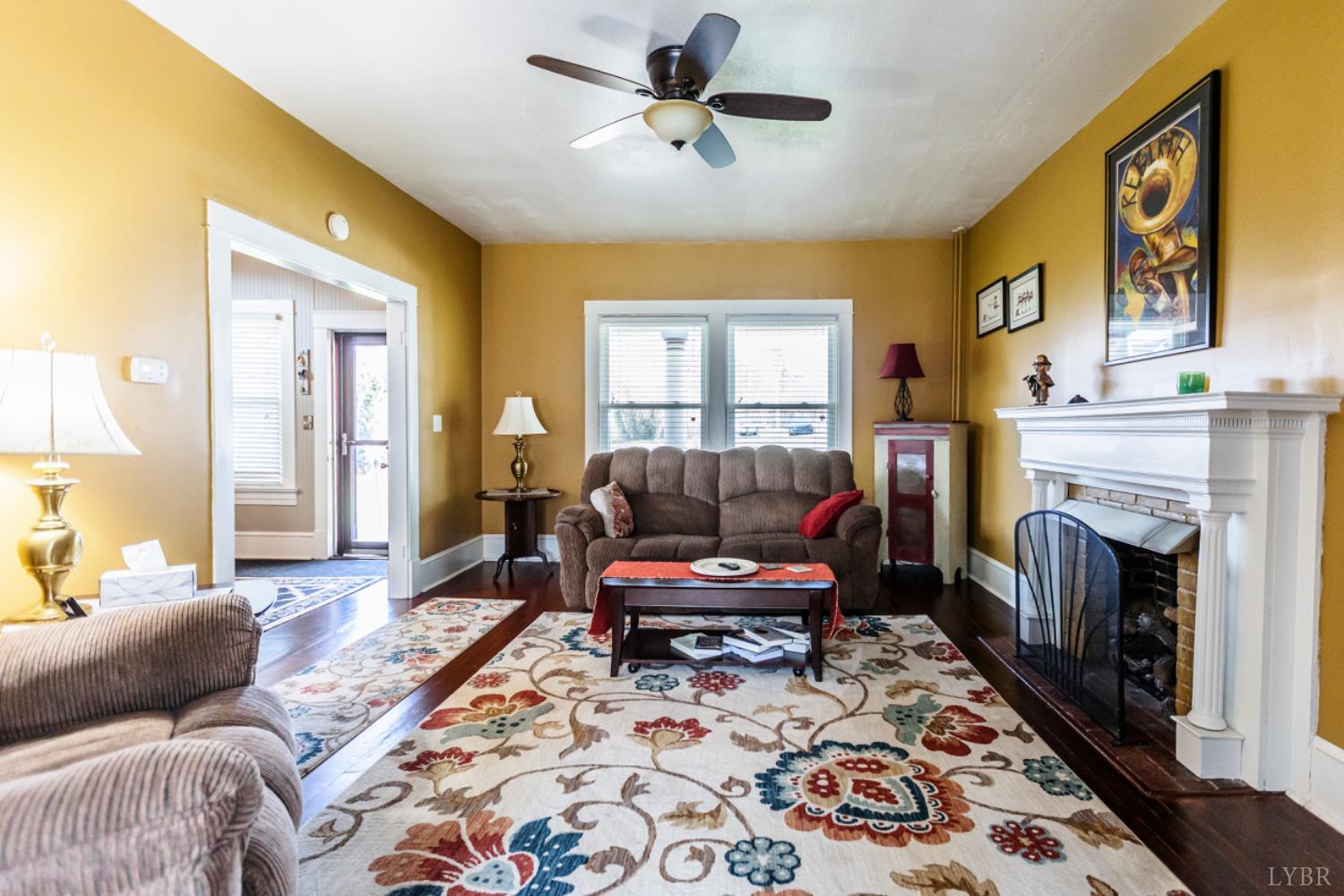 172 Pecan Street Pamplin, VA 23958 - Photo 8 of 40 a living room with furniture and a fireplace