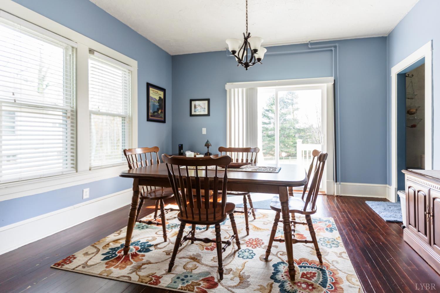 172 Pecan Street Pamplin, VA 23958 - Photo 10 of 40 a view of a dining room with furniture window and wooden floor