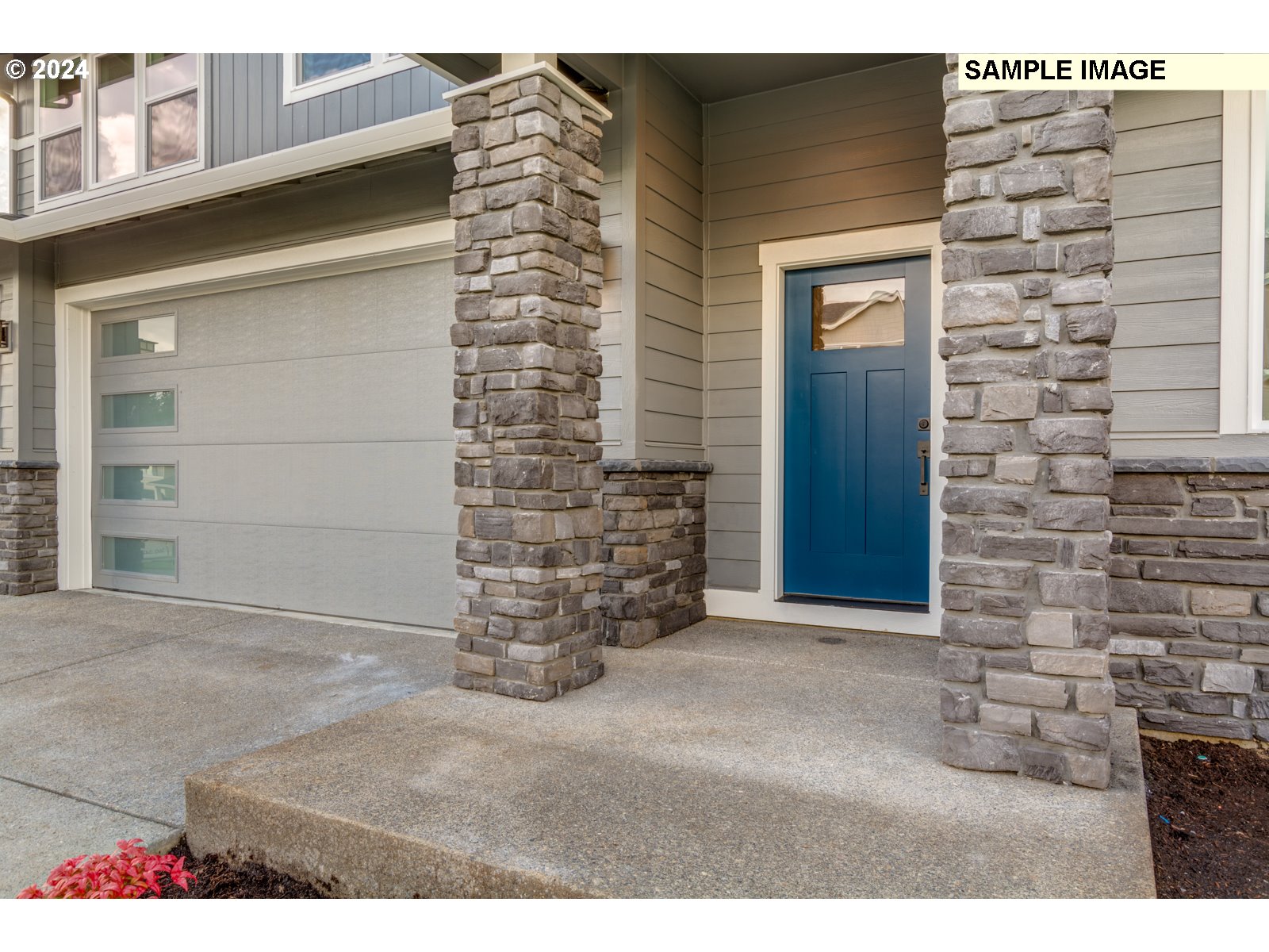 1301 North Kalani Loop, Unit 55 Ridgefield, WA 98642 - Photo 4 of 33 a view of outdoor space garage and window