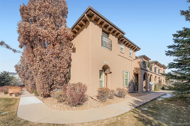 a view of a house with a park