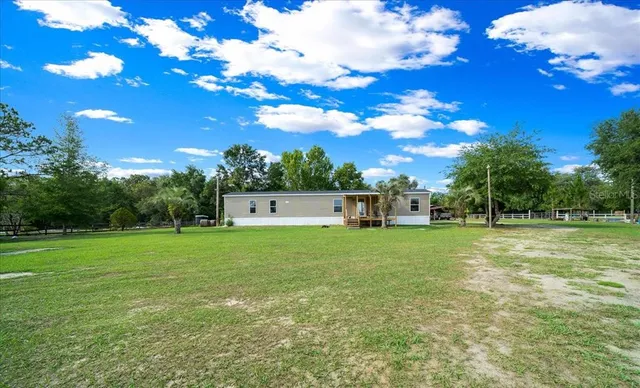 a house view with a garden