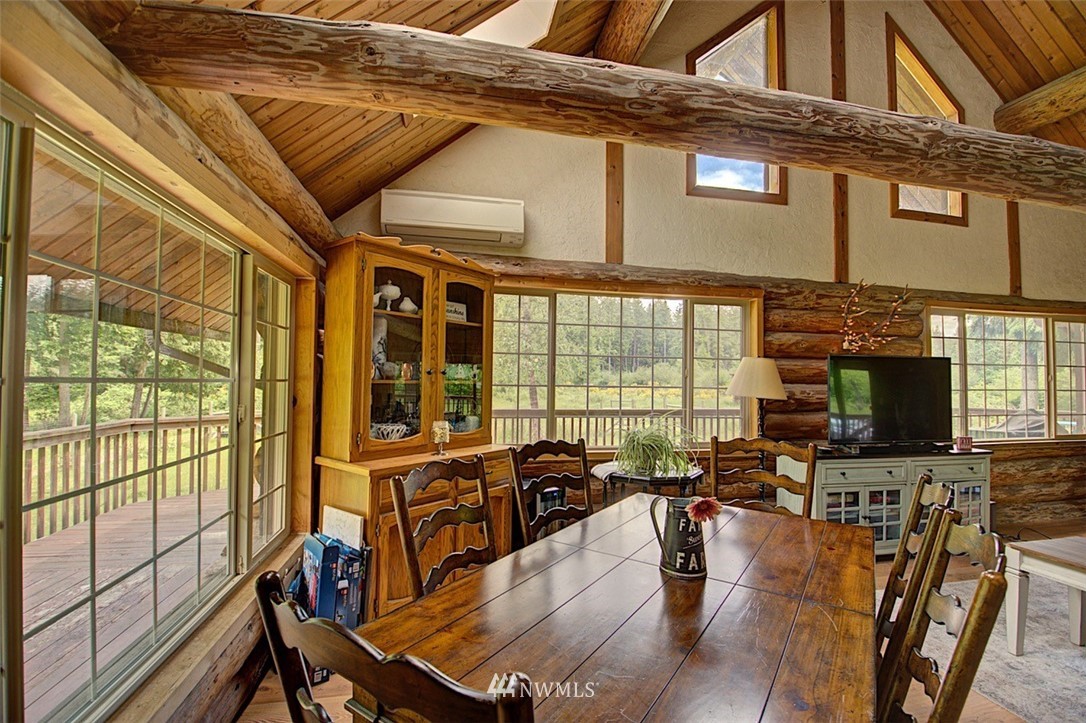 16634 Williams Lane Southwest Rochester, WA 98579 - Photo 11 of 33 a view of a dining room with furniture window and outside view