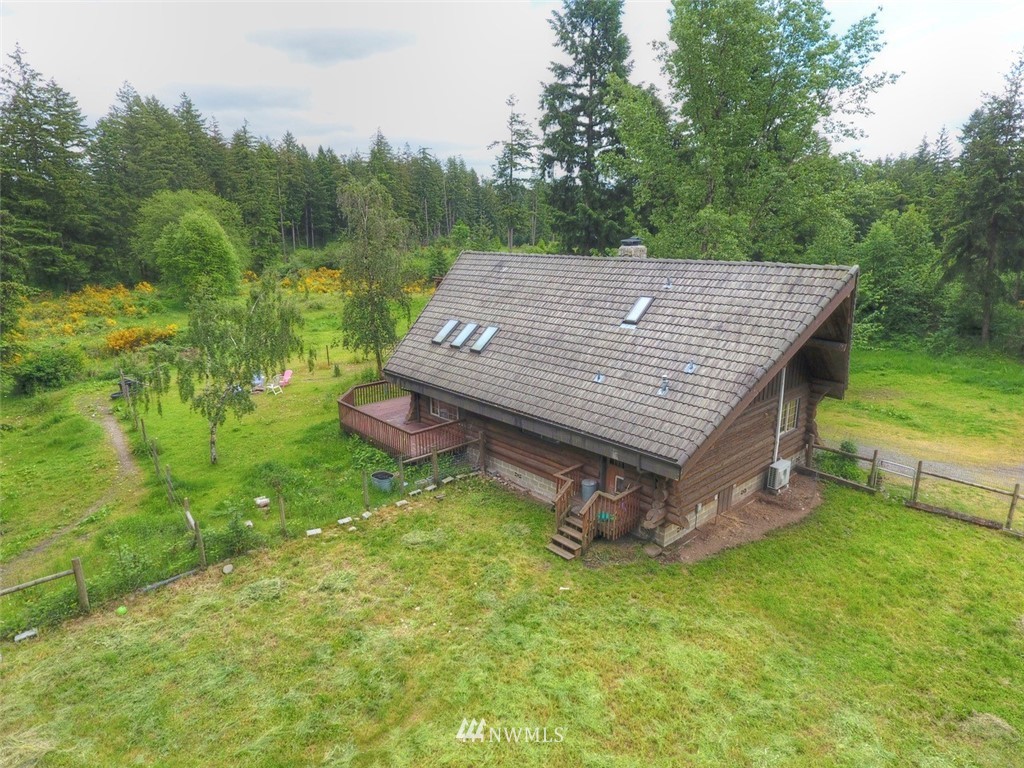 16634 Williams Lane Southwest Rochester, WA 98579 - Photo 28 of 33 a view of a wooden deck in the backyard